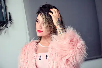 Tattooed Latina Poses and Shows Her Natural Tits