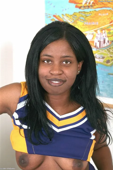Ebony Woman with Big Tits Flaunts Her Body in a Skirt and Uniform – photo 16 of 20
