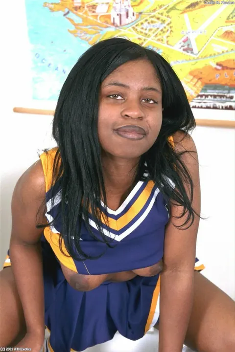 Ebony Woman with Big Tits Flaunts Her Body in a Skirt and Uniform – photo 18 of 20