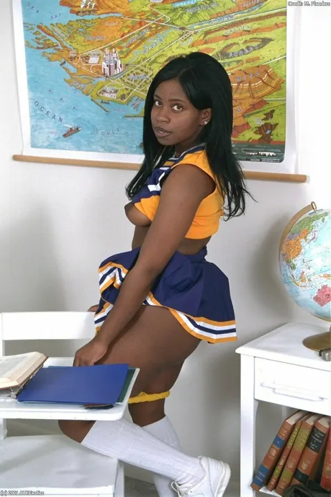 Ebony Woman with Big Tits Flaunts Her Body in a Skirt and Uniform – photo 5 of 20