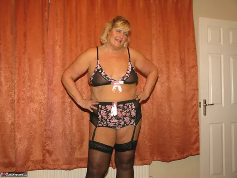 Curvy MILF Strips Out of Her Nurse Uniform into Lingerie – photo 13 of 16