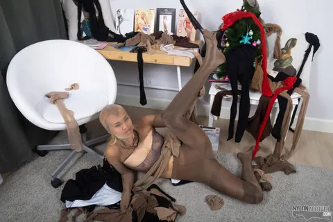 Woman in a Nun Uniform Strips and Layers Pantyhose Over Stockings – photo 13 of 16