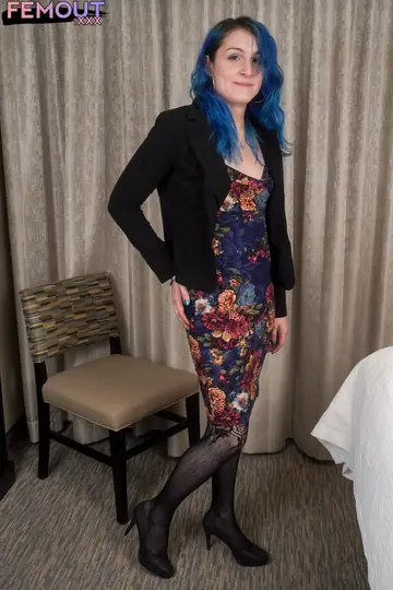 Trans Woman Lifts Her Dress Hem and Strips to Stockings