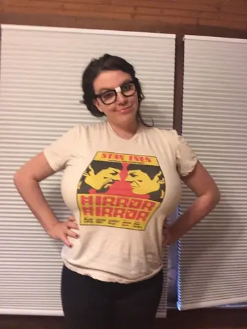 Curvy Brunette MILF with Big Tits Poses in Glasses