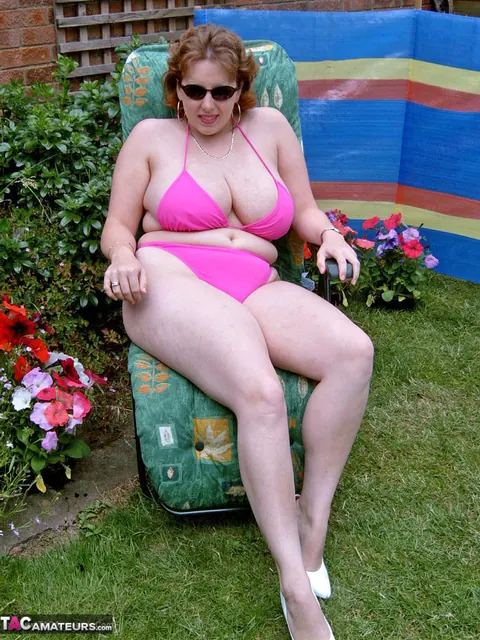 Curvy Claire: Curvy British MILF Strips Off Her Bikini in the Garden to Finger Her Pussy – photo 3 of 20