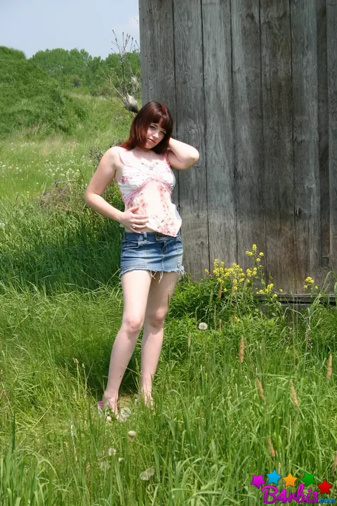 B4rbi3: Brunette Reveals Her Big Natural Tits in a Denim Skirt Outdoors – photo 1 of 12