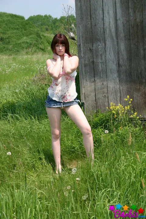 B4rbi3: Brunette Reveals Her Big Natural Tits in a Denim Skirt Outdoors – photo 2 of 12