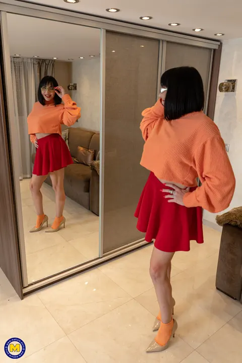 Jordan Perry: Spanish MILF Shows Her Booty in Panties Under a Costume Skirt – photo 4 of 18