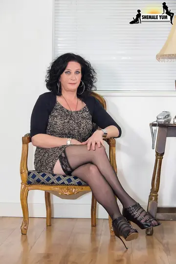 Trans Woman Pulls Down Her Dress and Poses in Stockings
