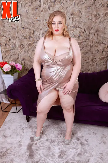 Curvy Redhead MILF Frees Her Big Tits from a Dress