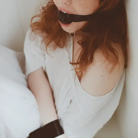 Redhead in Latex and Glasses Bound in Heels – photo 2 of 16