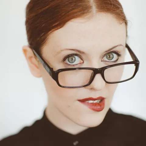 Redhead in Latex and Glasses Bound in Heels – photo 9 of 16