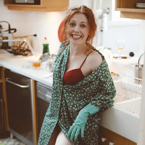 Redhead in Latex and Glasses Bound in Heels – photo 5 of 16