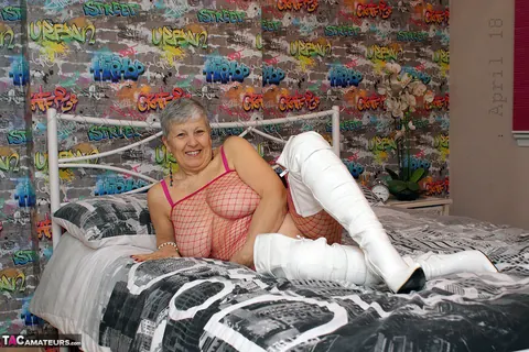 Blonde European MILF Flaunts Her Big Tits in Fishnet and Boots – photo 14 of 20
