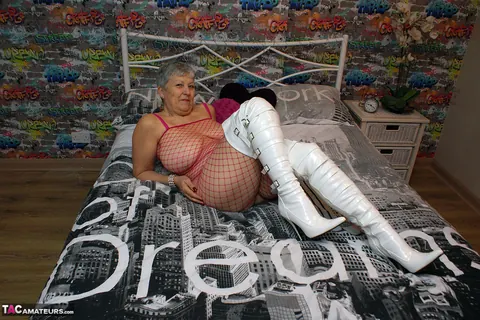 Blonde European MILF Flaunts Her Big Tits in Fishnet and Boots – photo 16 of 20