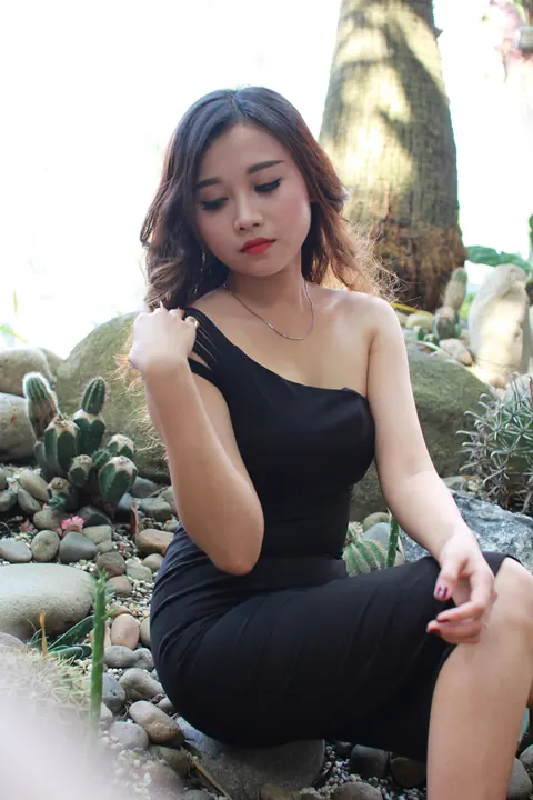 Petite Asian Woman Shows Her Legs in a Dress Outdoors – photo 3 of 21