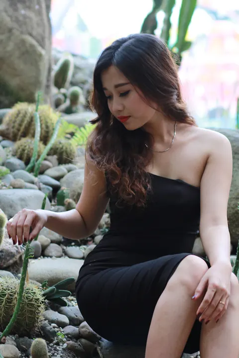 Petite Asian Woman Shows Her Legs in a Dress Outdoors – photo 2 of 21