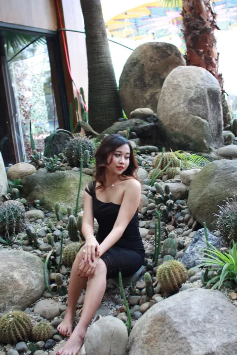 Petite Asian Woman Shows Her Legs in a Dress Outdoors – photo 6 of 21