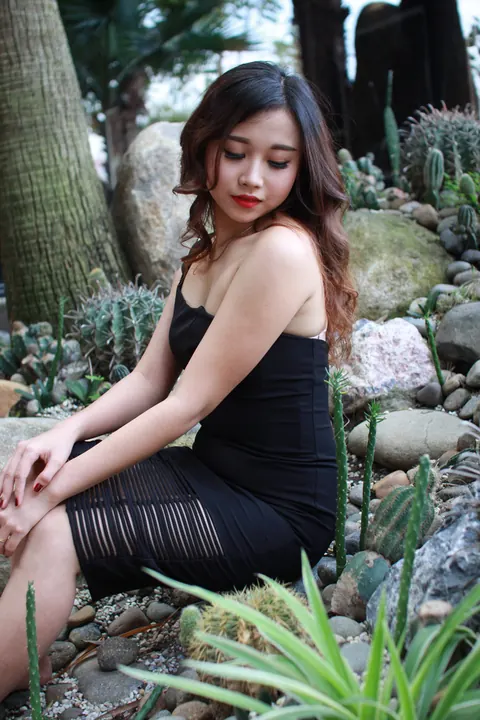 Petite Asian Woman Shows Her Legs in a Dress Outdoors – photo 5 of 21
