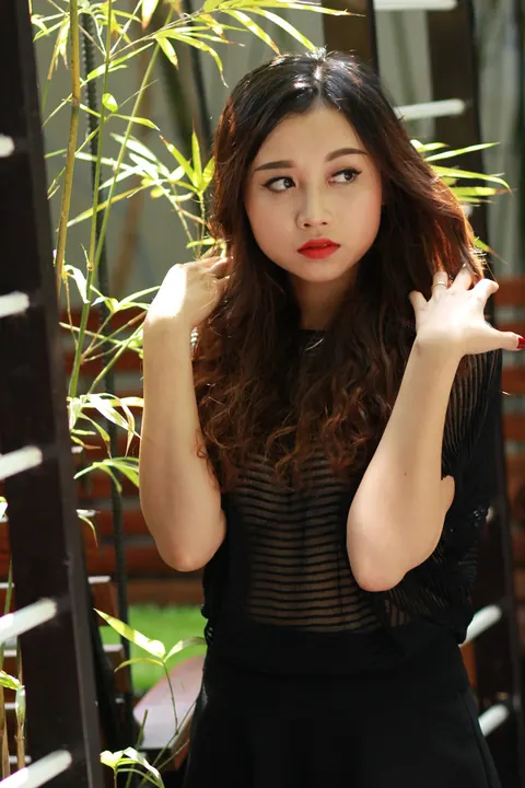 Petite Asian Woman Shows Her Legs in a Dress Outdoors – photo 13 of 21