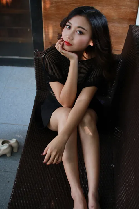 Petite Asian Woman Shows Her Legs in a Dress Outdoors – photo 8 of 21