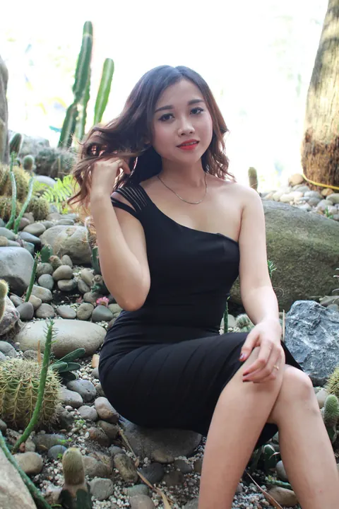 Petite Asian Woman Shows Her Legs in a Dress Outdoors – photo 4 of 21