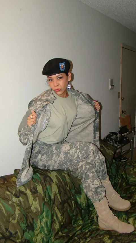 Woman Strips Off Her Combat Uniform and Poses in Panties – photo 5 of 15