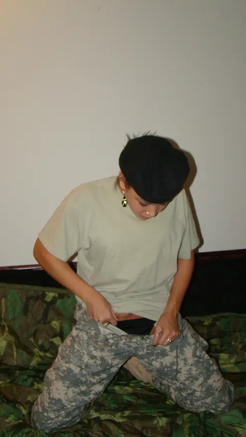 Woman Strips Off Her Combat Uniform and Poses in Panties – photo 10 of 15