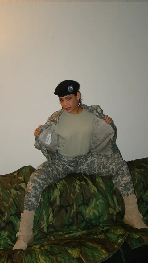 Woman Strips Off Her Combat Uniform and Poses in Panties – photo 2 of 15