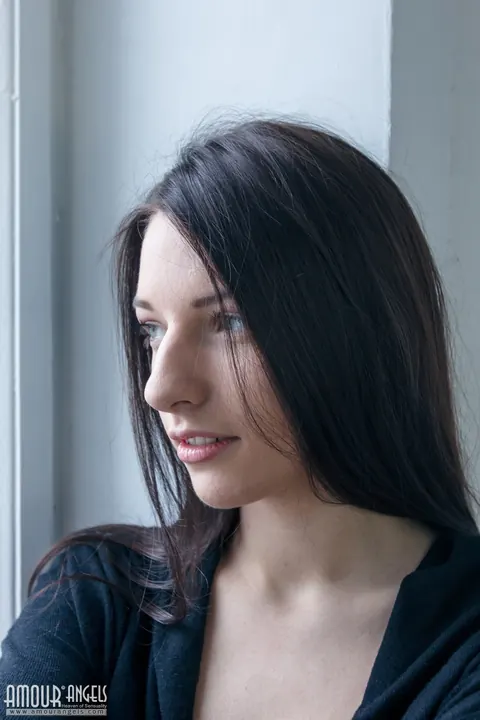 Brunette Keeps Socks On and Bares Her Shaved Pussy on the Window Sill – photo 2 of 20