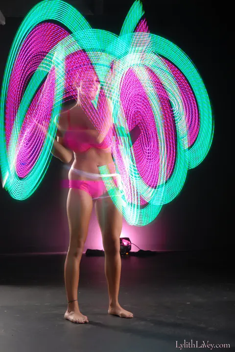 Lylith Lavey: Busty Brunette Poses in Lingerie Under a Light Show – photo 15 of 21