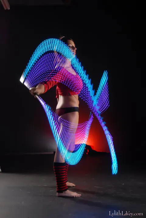 Lylith Lavey: Busty Brunette Poses in Lingerie Under a Light Show – photo 4 of 21