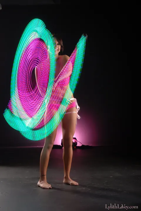 Lylith Lavey: Busty Brunette Poses in Lingerie Under a Light Show – photo 16 of 21