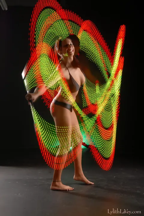 Lylith Lavey: Busty Brunette Poses in Lingerie Under a Light Show – photo 13 of 21