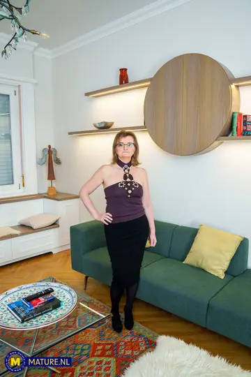 Mature Hungarian Brunette in Glasses Flashes Her Tits