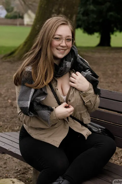 Rose Fessenden: Busty Brunette in Pantyhose and Glasses Unveils Her Cleavage Outdoors – photo 2 of 12