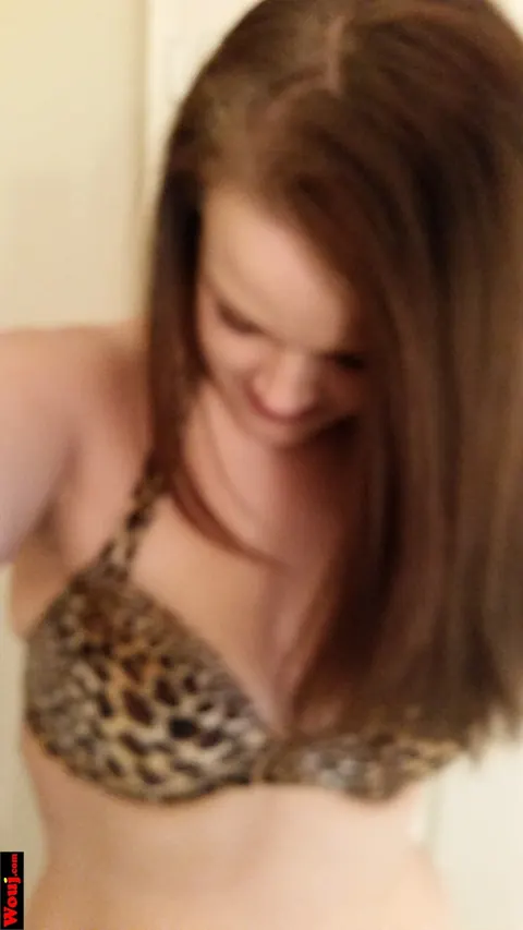 Woman in a Bikini Takes Selfies on Her Phone – photo 5 of 15
