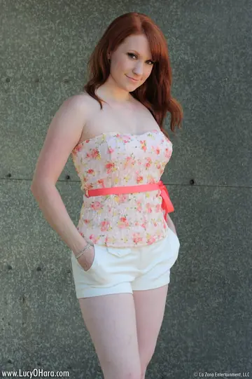 Busty Redhead Plays with a Dildo in Her Shorts Outdoors
