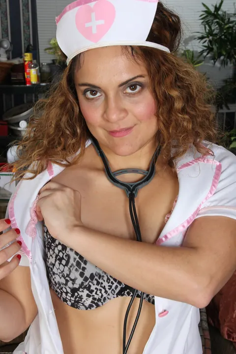 Drew Jones: Petite Spanish MILF in Uniform Strips and Spreads Her Shaved Pussy – photo 2 of 21