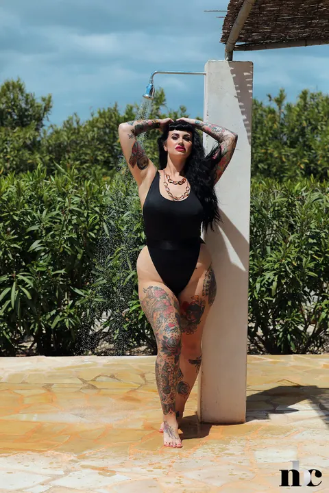 Tattooed BBW Strips Out of Her Bikini in an Outdoor Shower – photo 2 of 21