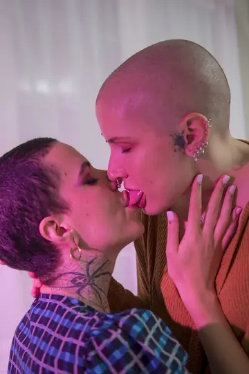 Two Women Have Strap-On Sex and Lick Pussy