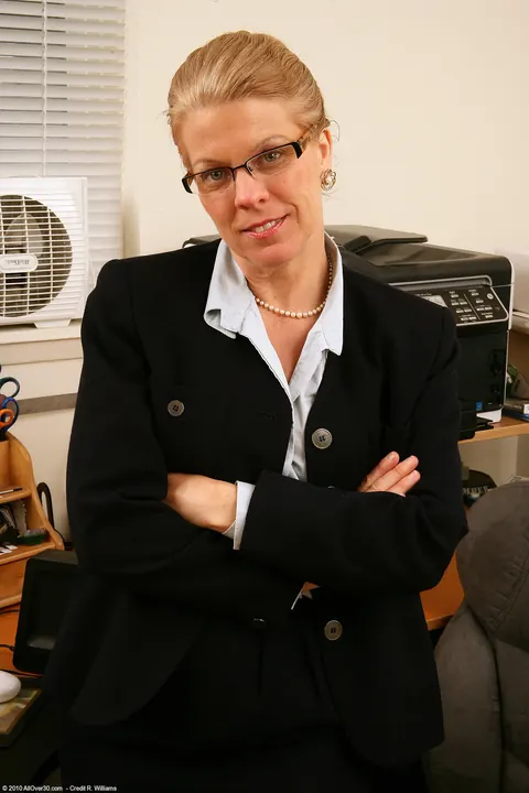 Lauren E: Thick Blonde MILF Strips Out of Her Uniform in the Office – photo 5 of 20