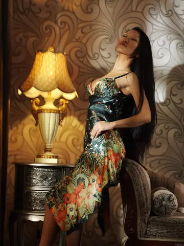 Asian Babe Spreads Her Trimmed Pussy in High Heels
