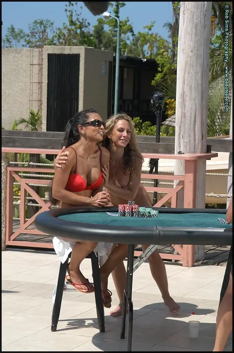 Busty and Slim Lesbians Play Strip Poker at a Public Pool – photo 10 of 15