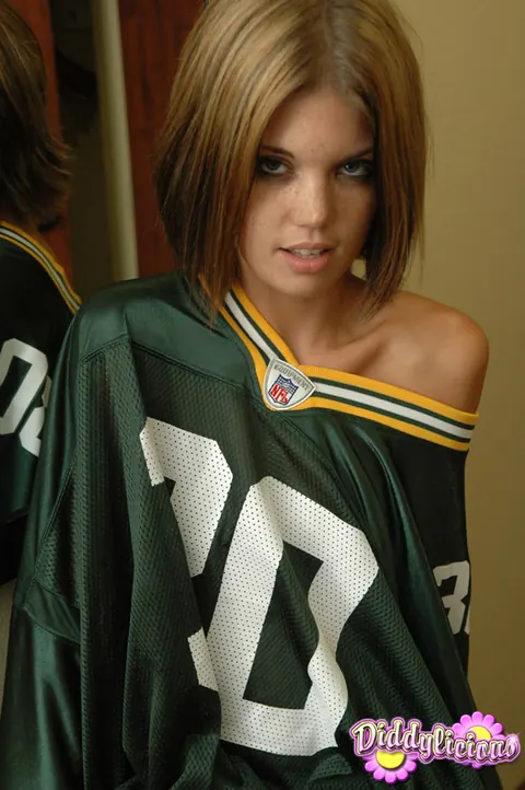 Diddylicious: Slim Brunette Peels Off Her Jeans and Shows Her Enhanced Tits – photo 3 of 12