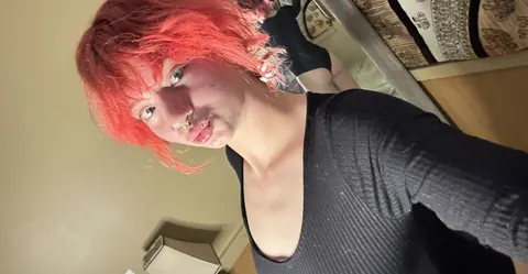 Skinny Redhead Bends Over in Front of a Mirror for a Phone Selfie – photo 11 of 11