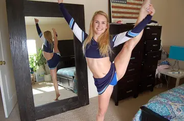 Blonde with Big Natural Tits Spreads Her Legs in Front of a Mirror