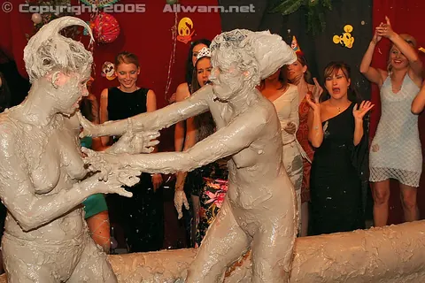 Woman Wrestles Opponent in Mud Pit – photo 12 of 15