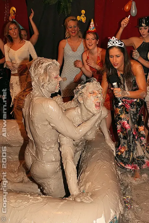 Woman Wrestles Opponent in Mud Pit – photo 10 of 15