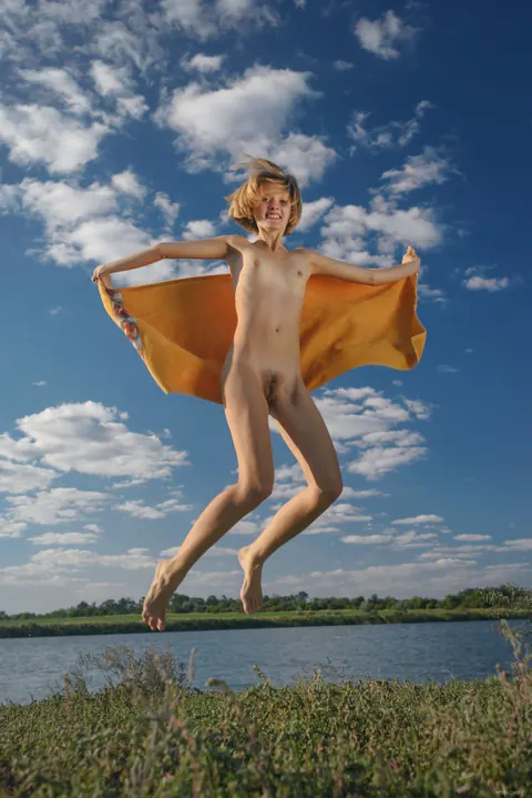 Petite Blonde Poses Naked on the Beach – photo 5 of 21